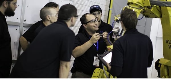 Jason Markesino works on FANUC robot